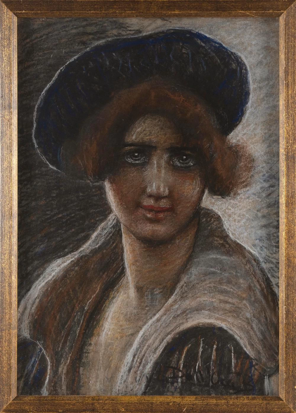 Ritratto di una giovane donna con un cappello blu